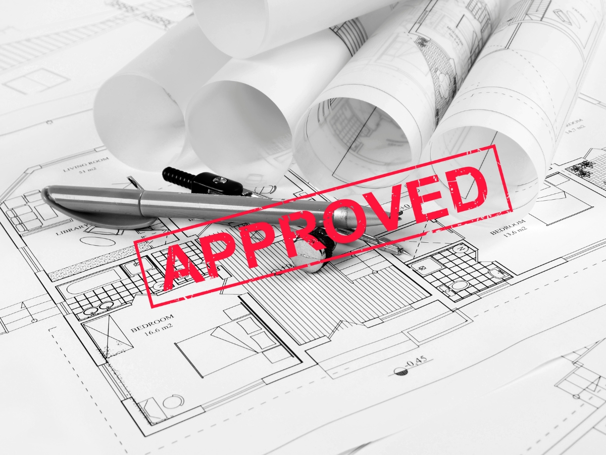 Drawings with an "approved "stamp indicading the legal approval.